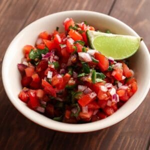 White bowl with homemade pico de gallo