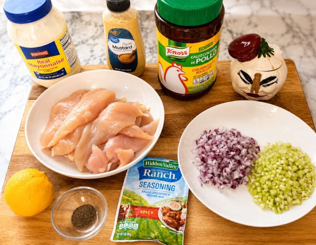 ingredients for Easy Chicken Salad Chick Copycat Recipe on a wooden cutting board