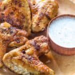 Alabama white barbeque sauce with smoked chicken wings