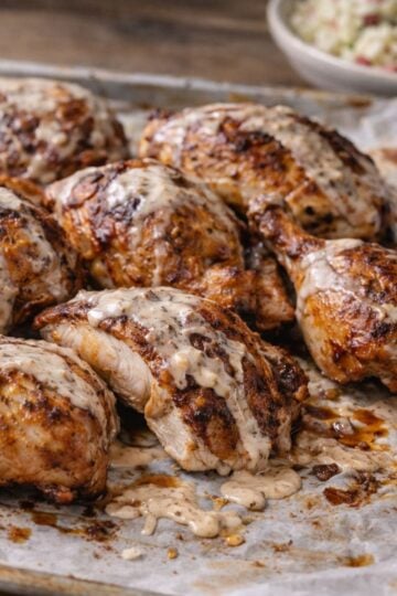 Finished chicken slathered in white Alabama Barbeque Sauce