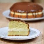 Slice of The Best Boston Cream Pie on a white plate