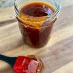 Mason jar with finished Sweet & Smoky Apricot BBQ Sauce