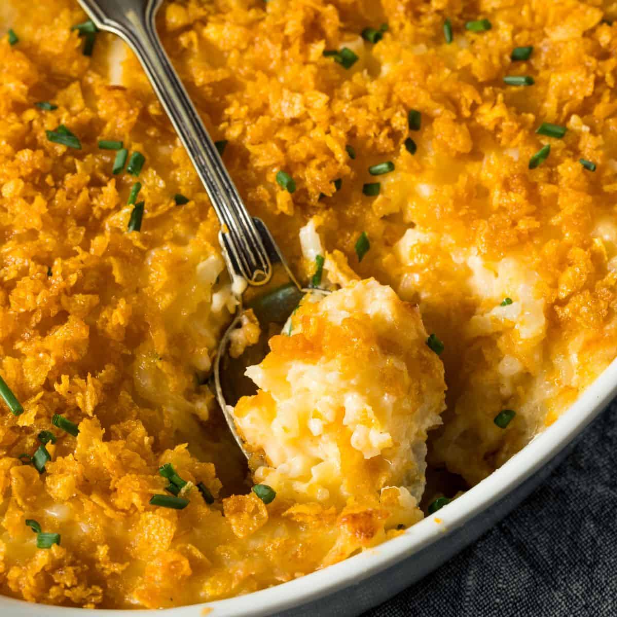 Finished Funeral Potatoes with a spoon