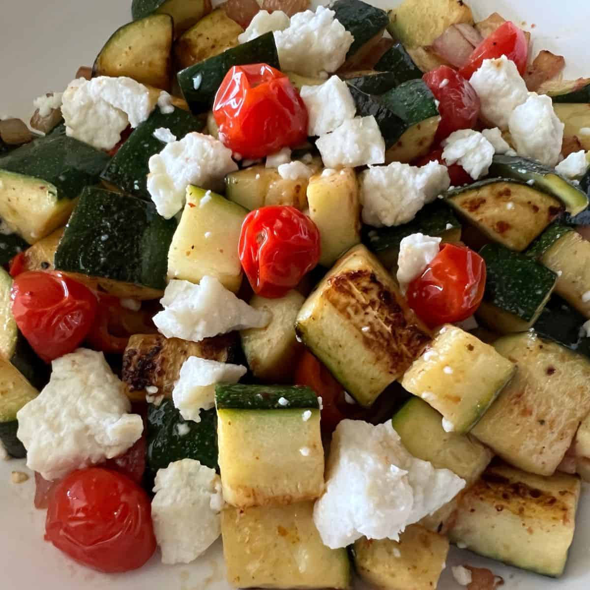 Finished Mexican Zucchini in a white bowl